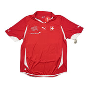 Camiseta de local firmada por el equipo de Suiza 2010/11 *Nueva con etiquetas* (XL) Puma